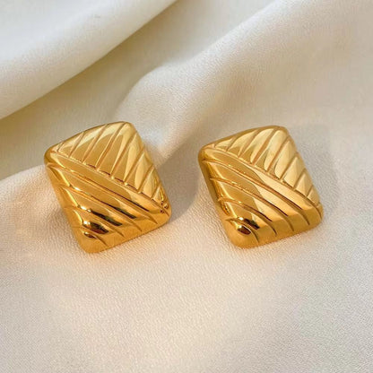 Bold Curve Statement Studs - 18k gold-plated